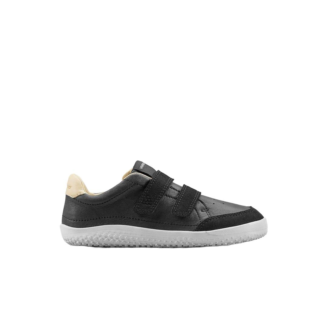 Vivobarefoot Kids Gobi sneaker in obsidian black leather with dual velcro straps and a flexible white rubber sole.