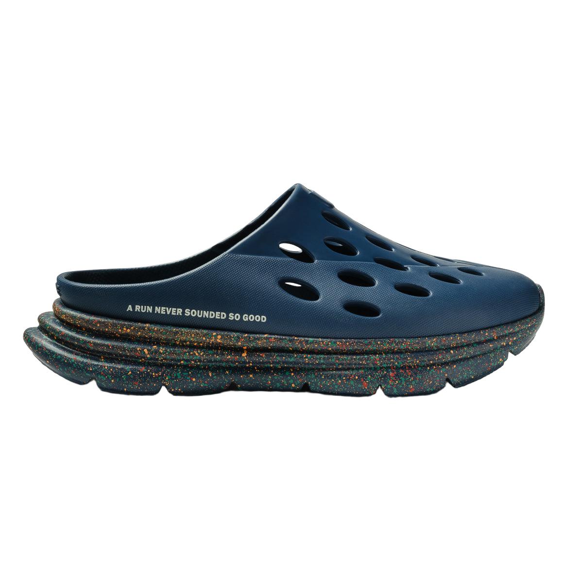 Navy Kane x Diplo Revive OB recovery slide with perforated foam upper and speckled, multi-colored cushioned midsole.