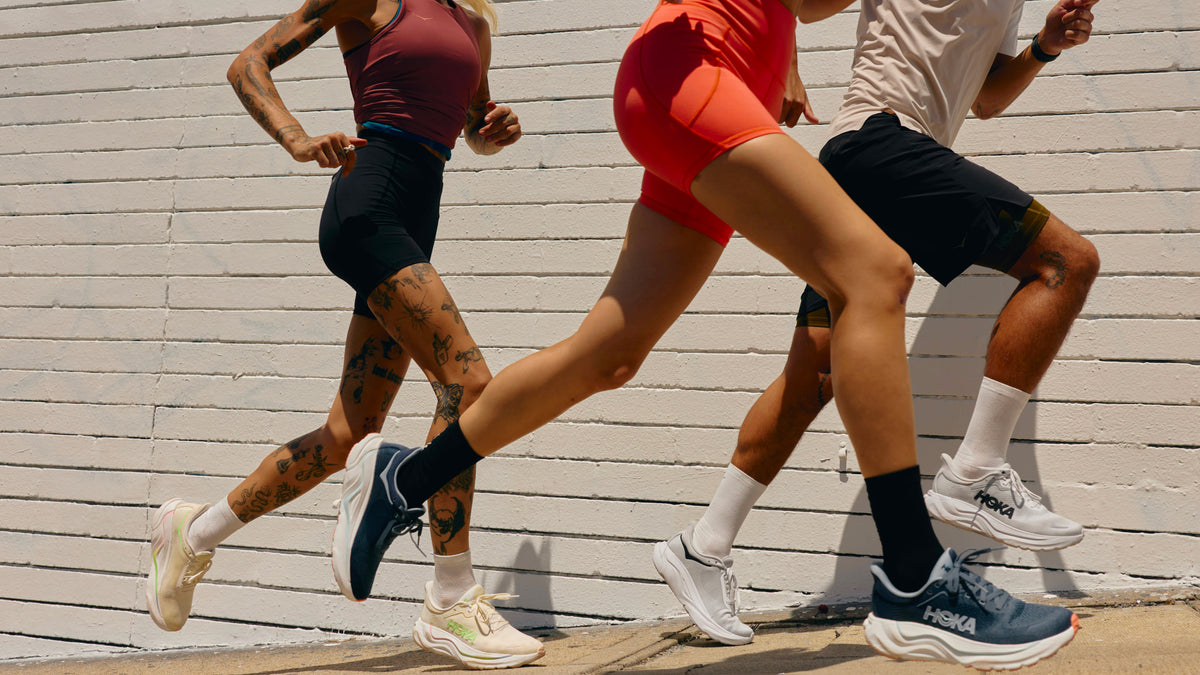 Three Runners wearing the new Hoka Arahi 9 available at Footprint USA