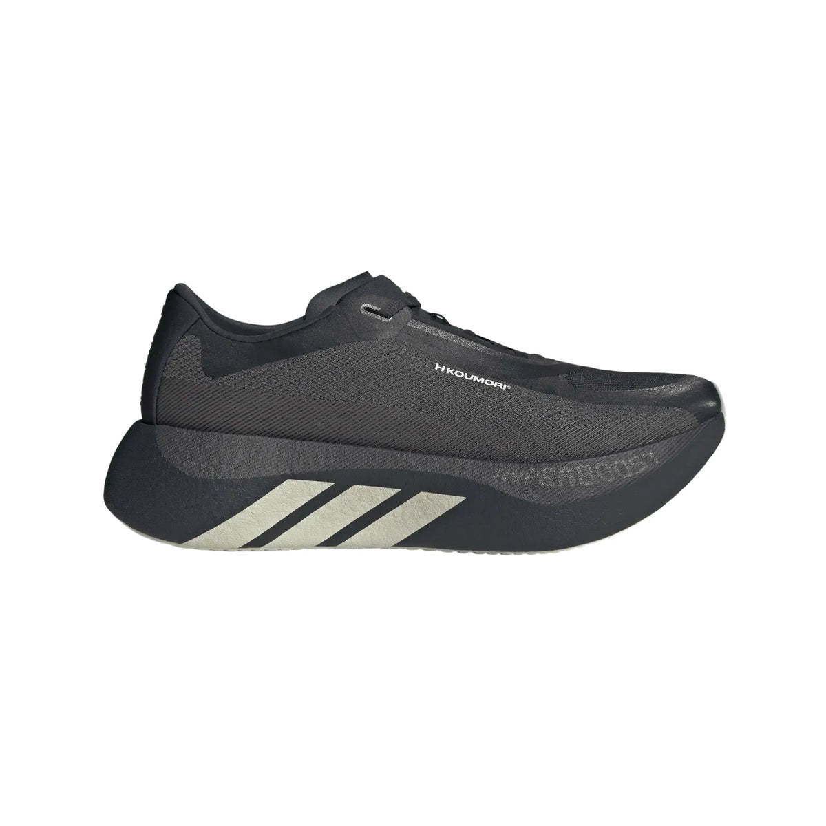 Black Adidas Hyperboost Edge Hermanos Koumori running shoe with a thick cushioned midsole and three-stripe branding.