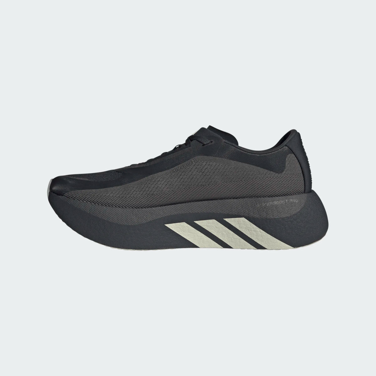 Adidas Men's Hyperboost Edge Hermanos Koumori running shoe in black with a thick cushioned sole and white side stripes.