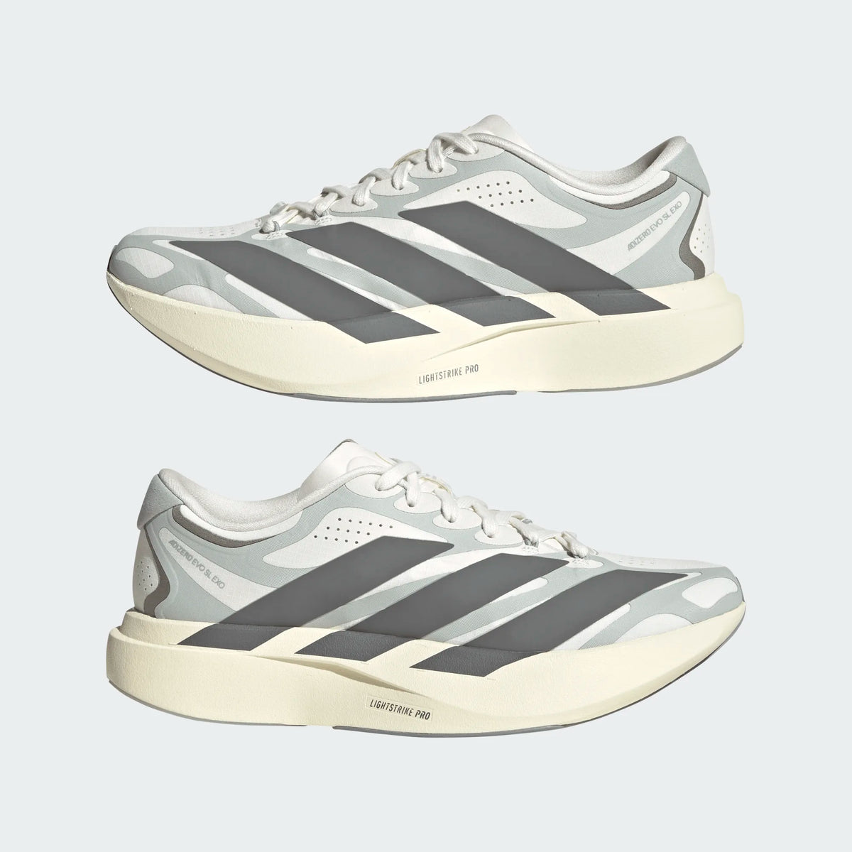 Adidas Adizero EVO SL EXO running shoes in off-white and grey with thick LightstrikePro cushioning and signature side stripes.