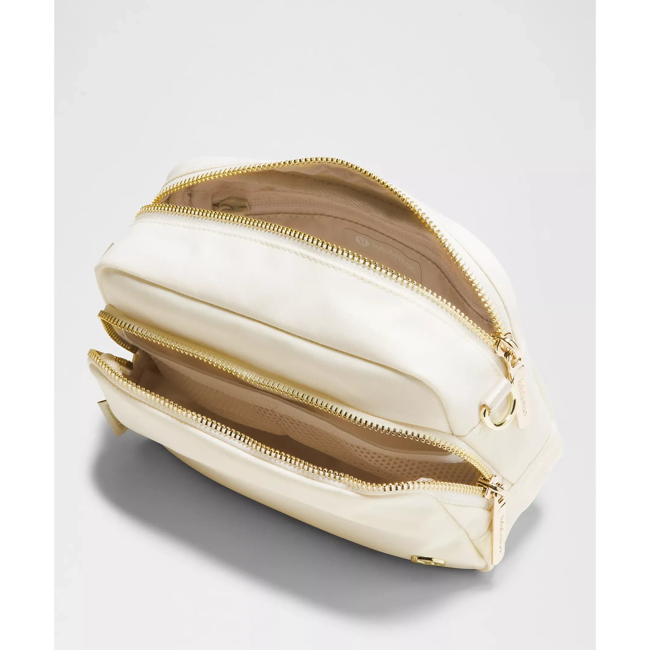 Lululemon Everywhere Crossbody Bag 2L Metal Hardware in Light Ivory/Gold