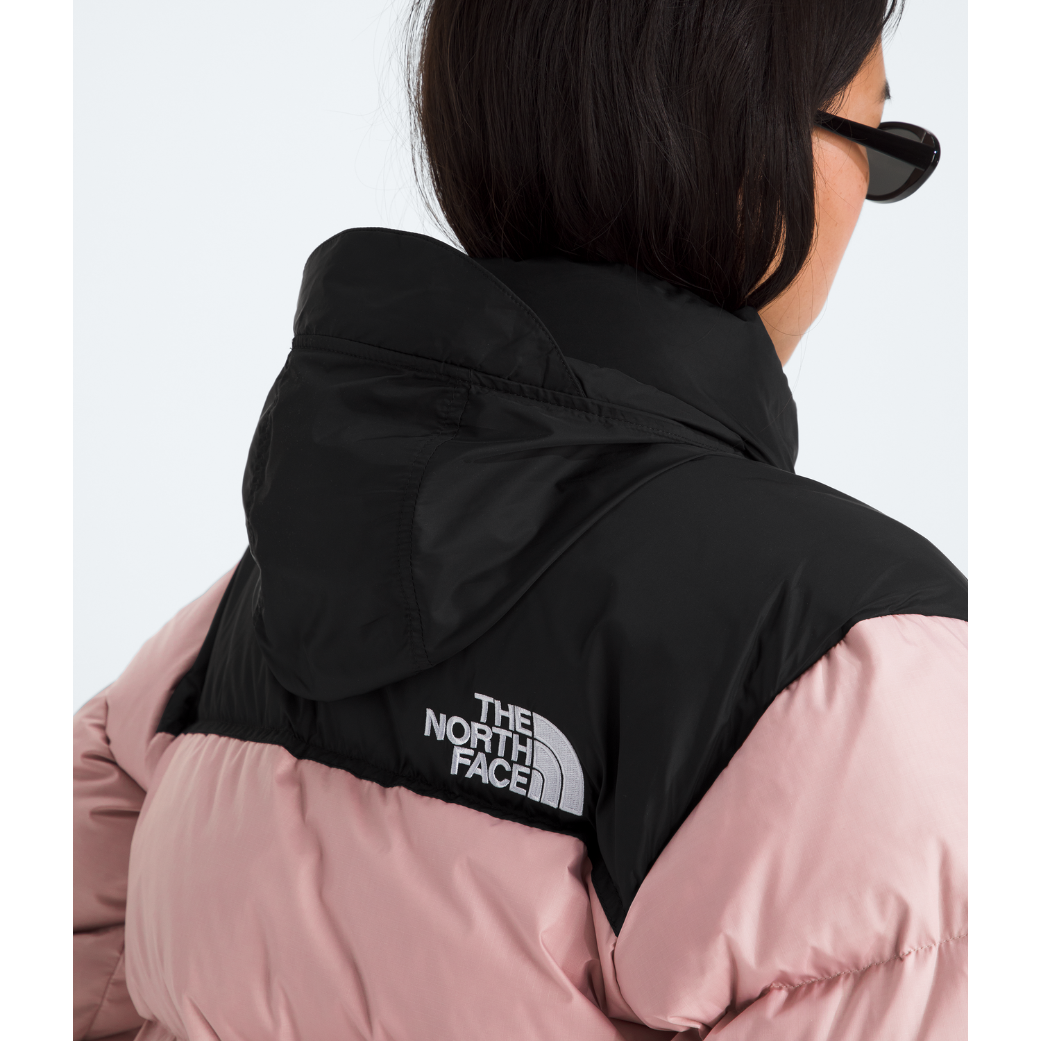 The North Face Women’s 1996 Retro Nuptse Jacket in Metal Pink/TNF Black
