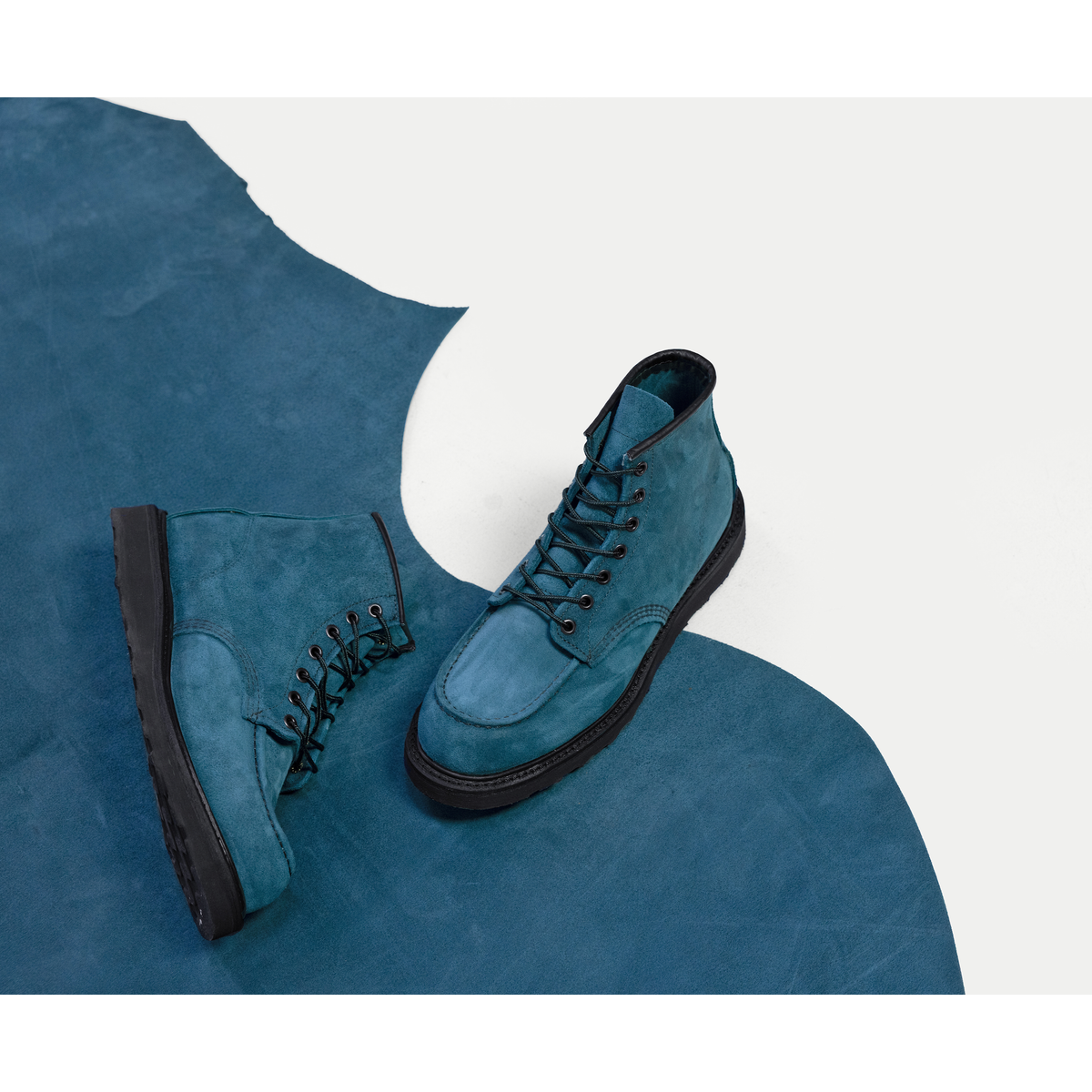 Red Wing 6-inch Classic Moc boots in Tidal Muleskinner blue roughout leather with black laces and Traction Tred outsoles.