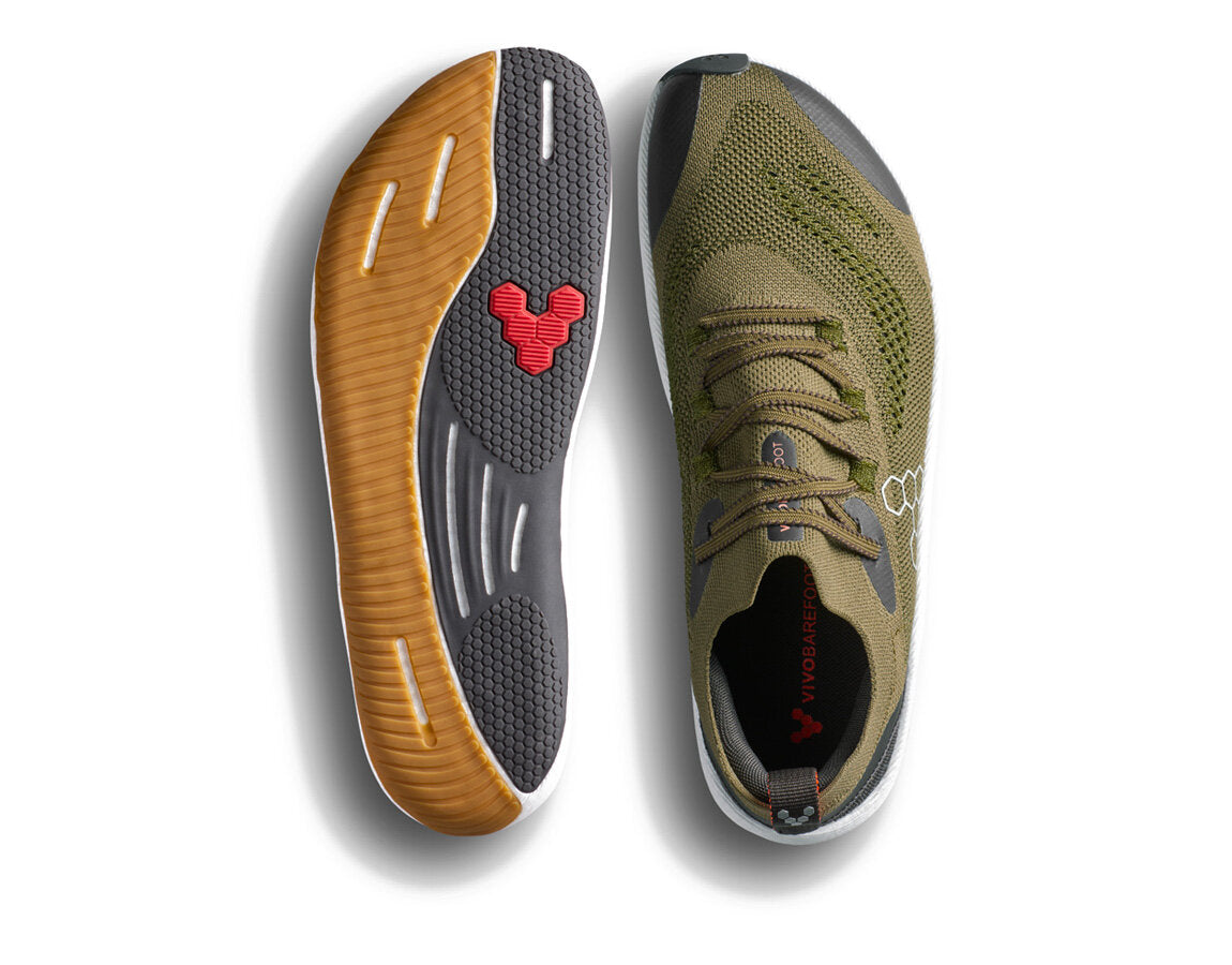 Olive green Vivobarefoot Primus Flow Knit shoe with a flexible, ultra-thin gum rubber sole and wide toe box design.