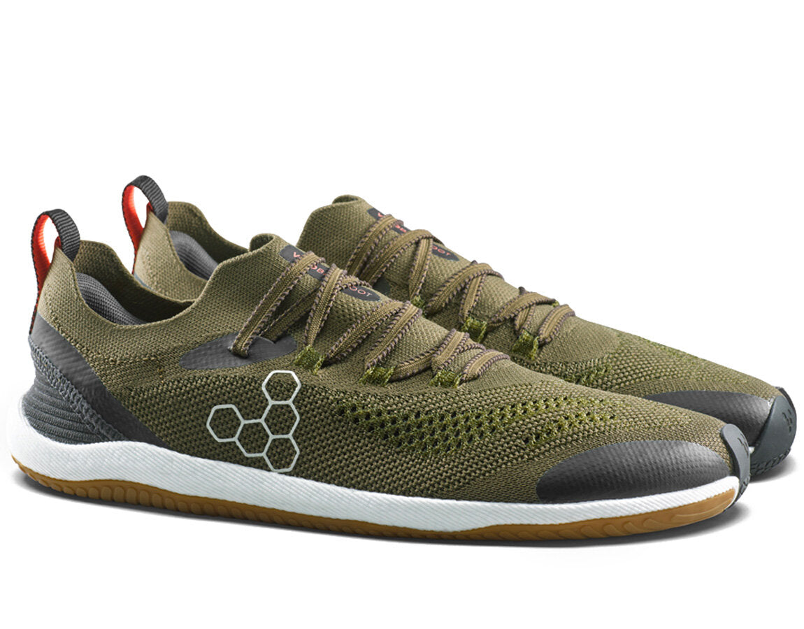 Olive green Vivobarefoot Primus Flow Knit barefoot running shoes with a breathable knit upper and flexible gum rubber sole.