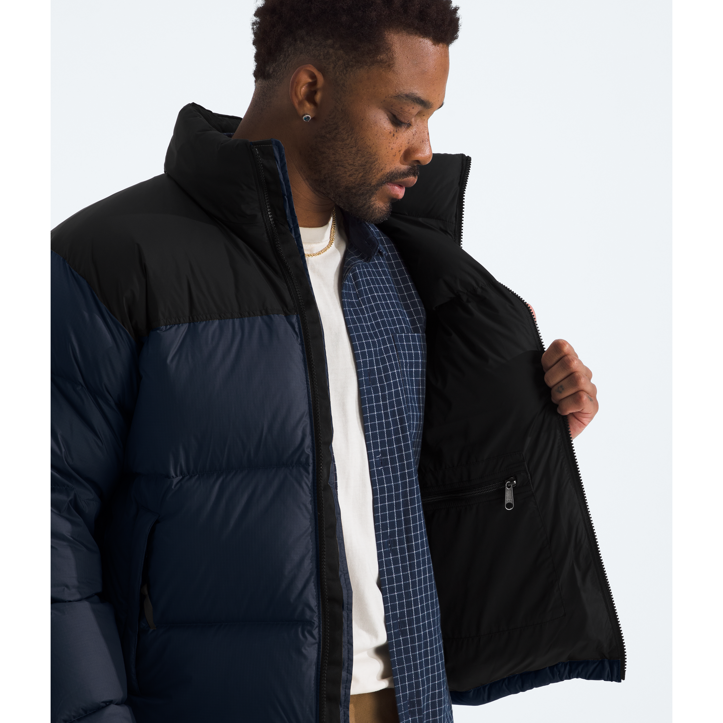 The North Face Men's 1996 Retro Nuptse Jacket in Summit Navy/TNF Black The North Face Men's 1996 Retro Nuptse Jacket in Summit Navy/TNF Black