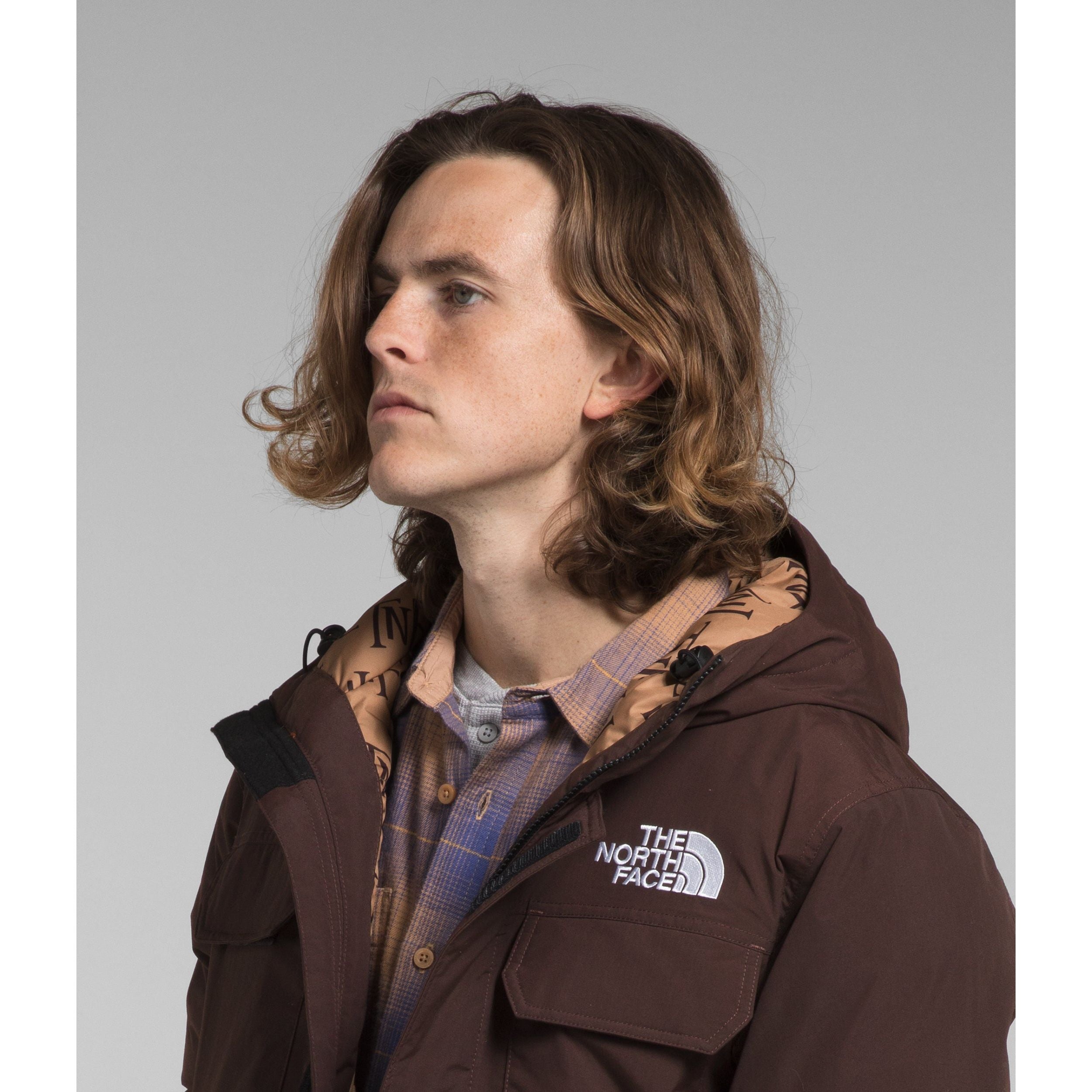 The North Face Men's McMurdo Bomber in Coal Brown Almond Butter Monogram Print  Men's Apparel