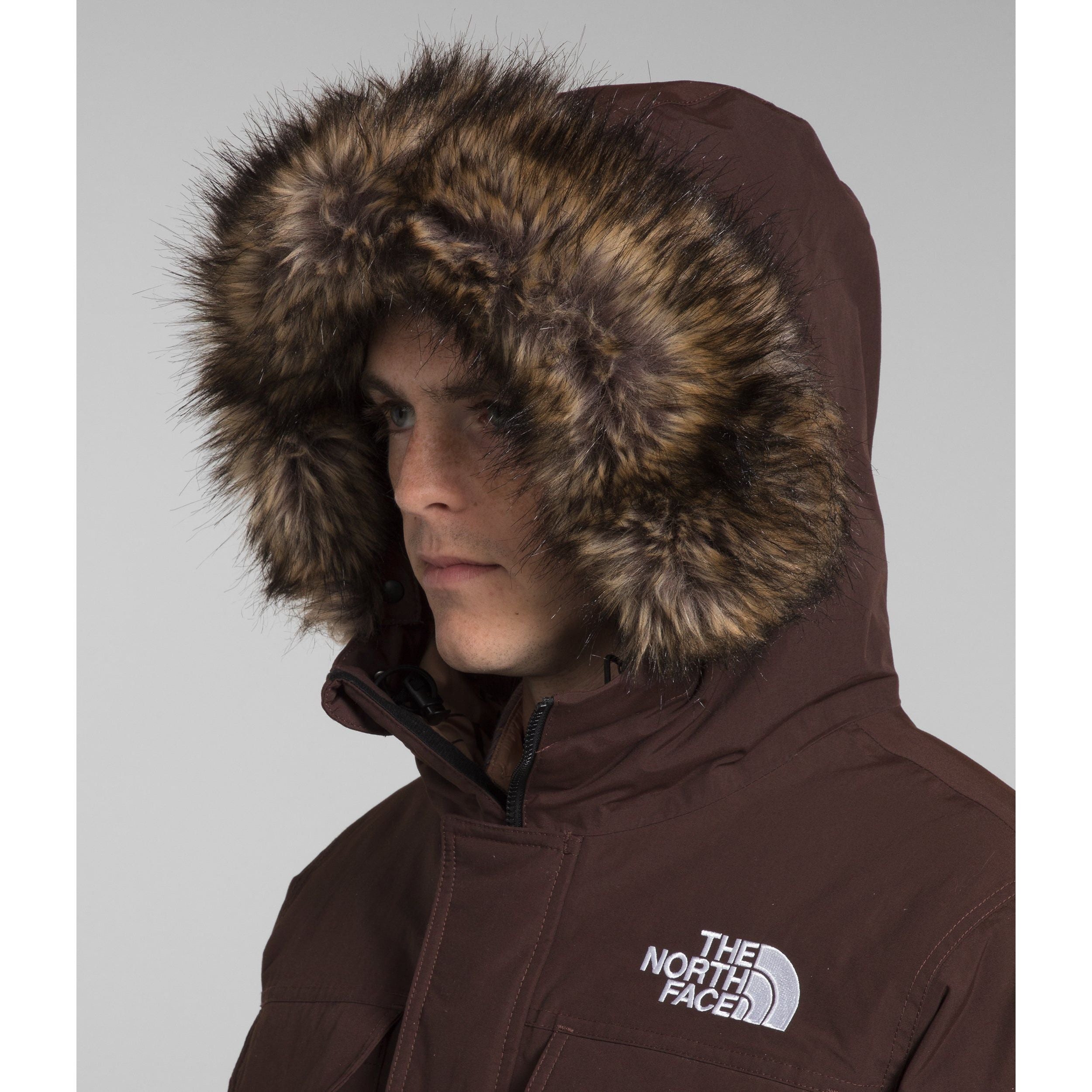 The North Face Men's McMurdo Bomber in Coal Brown Almond Butter Monogram Print  Men's Apparel