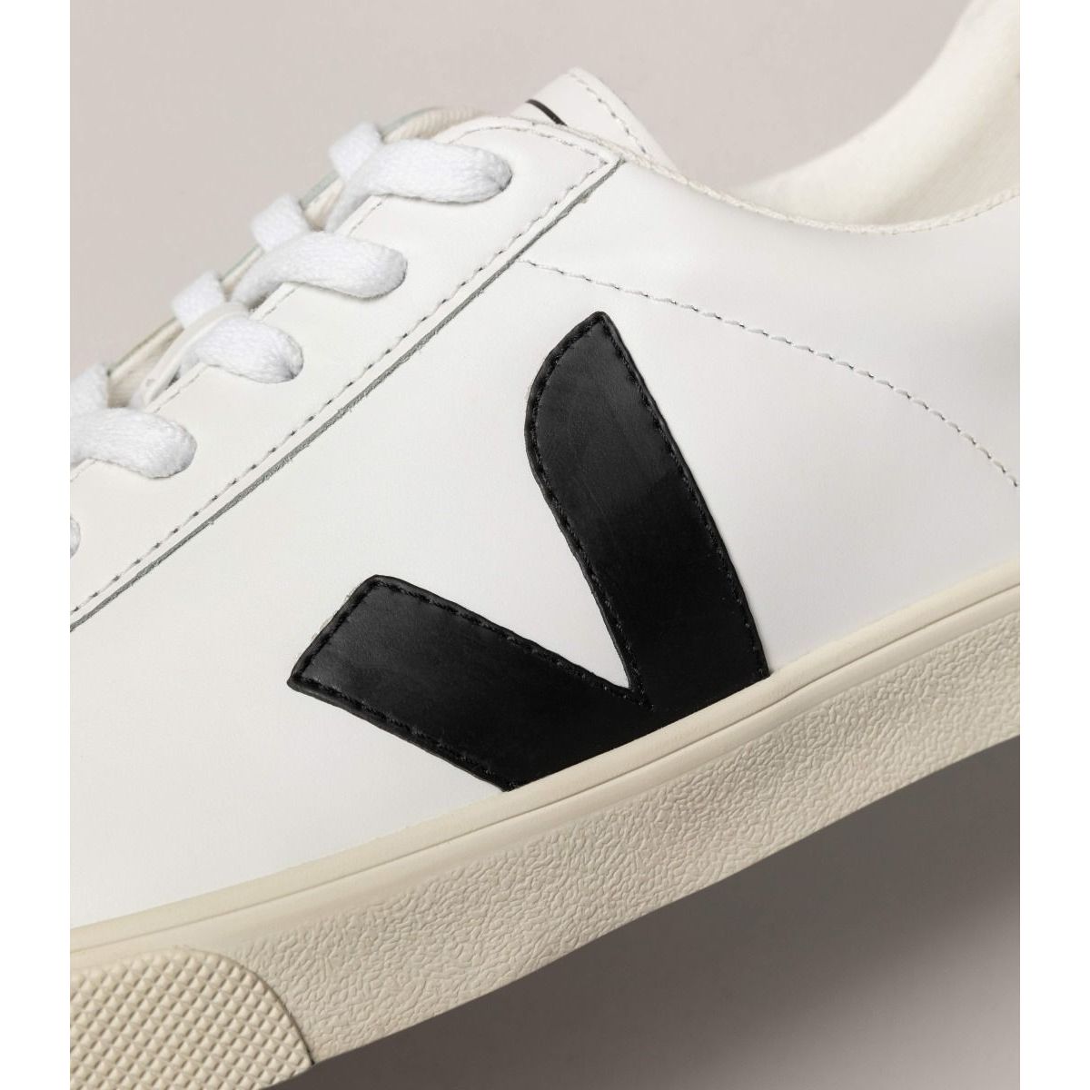 Veja Women's Esplar Leather Sneaker in White Black  Unisex Footwear