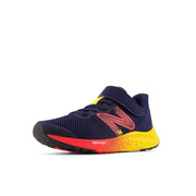 New Balance Kid's Fresh Foam Arishi V4 Bungee Lace with Top Strap in Team Navy with Electric Red and Egg Yolk  Kid