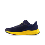 New Balance Kid's Fresh Foam Arishi V4 Bungee Lace with Top Strap in Team Navy with Electric Red and Egg Yolk  Kid